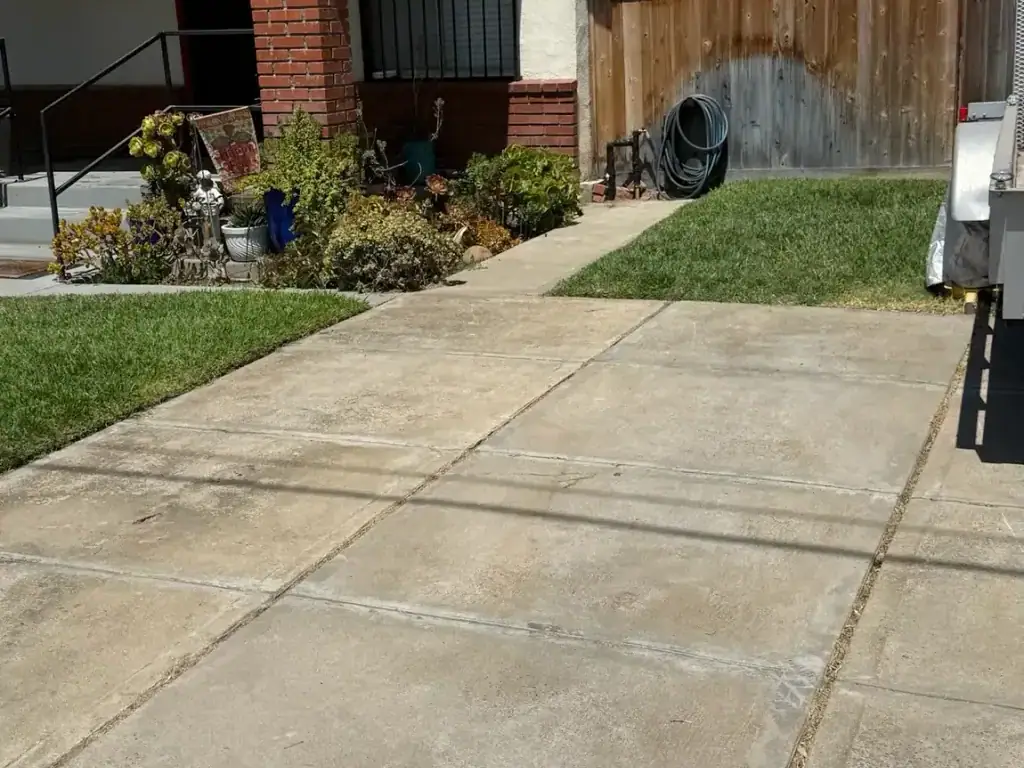 The same front walk and driveway left clear