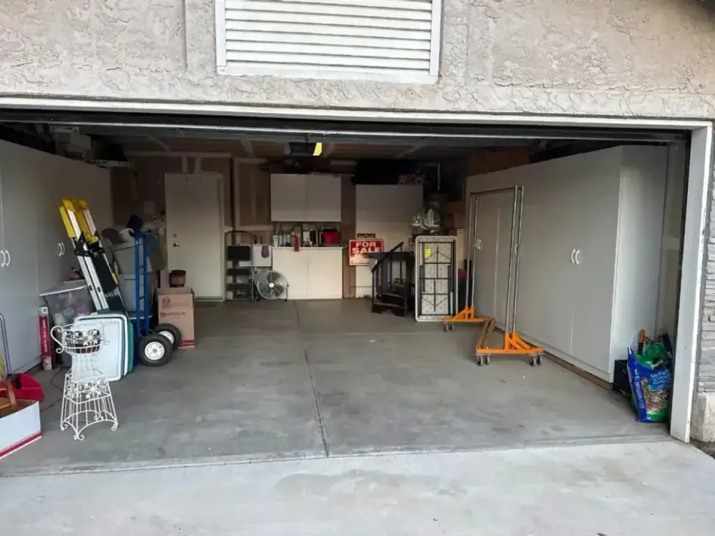 The same garage emptied with the floor clear